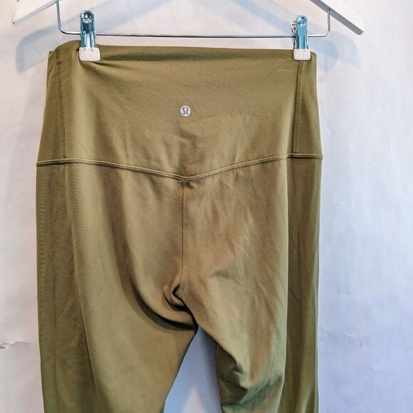 𝅺LULULEMON Unlimit High Rise Tight Bronze Green size 10 in EUC - Picture 9 of 10